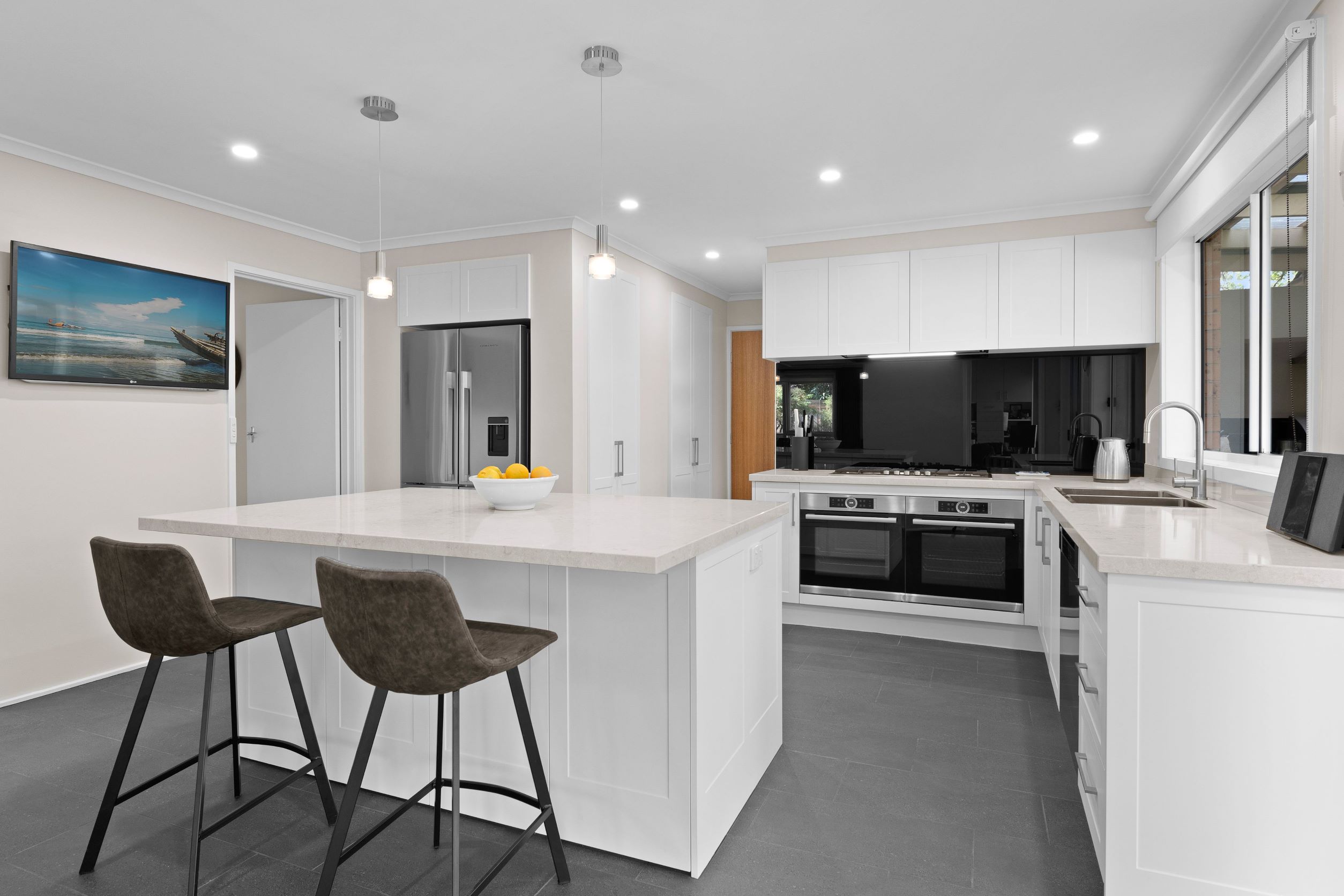 Incorporating a kitchen island into your design, it optimises space